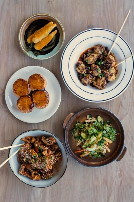A table of vegan dishes from Men and Beasts.