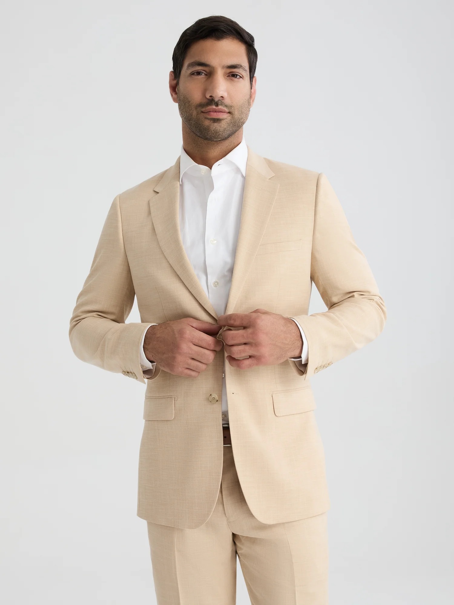 SuitShop men's linen-look sand suit jacket.