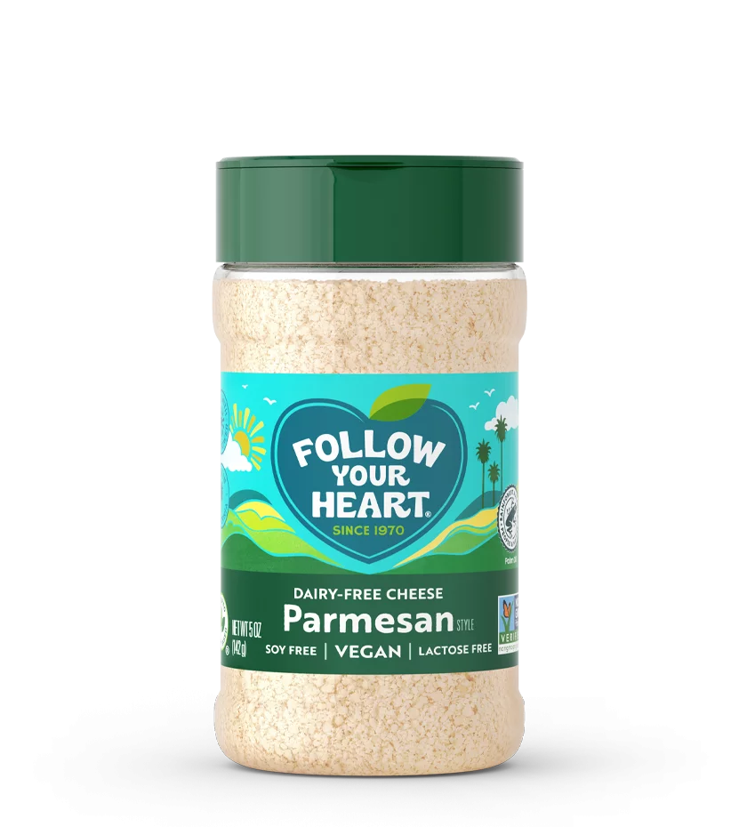 Container of Follow Your Heart grated parmesan-style dairy-free cheese.