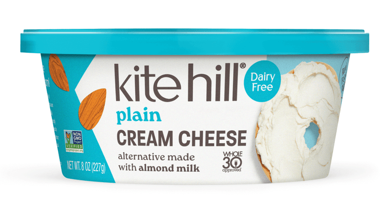Tub of Kite Hill plain almond milk cream cheese alternative.