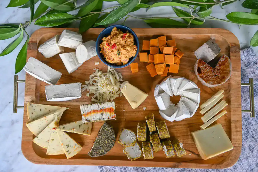 Rebel Cheese vegan cheese board with assorted dairy-free cheeses.