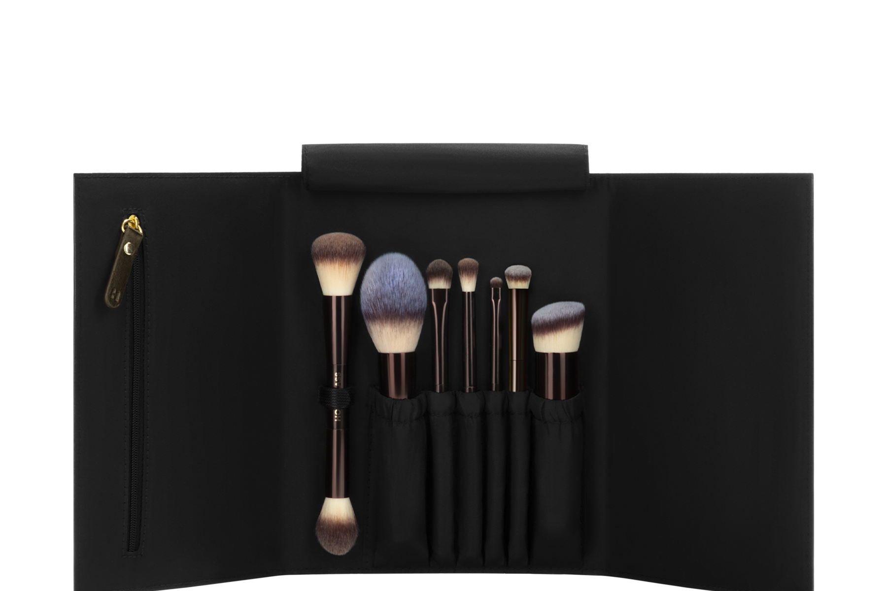 An open Hourglass Vegan Travel Brush Set showing seven brushes and the black travel roll.