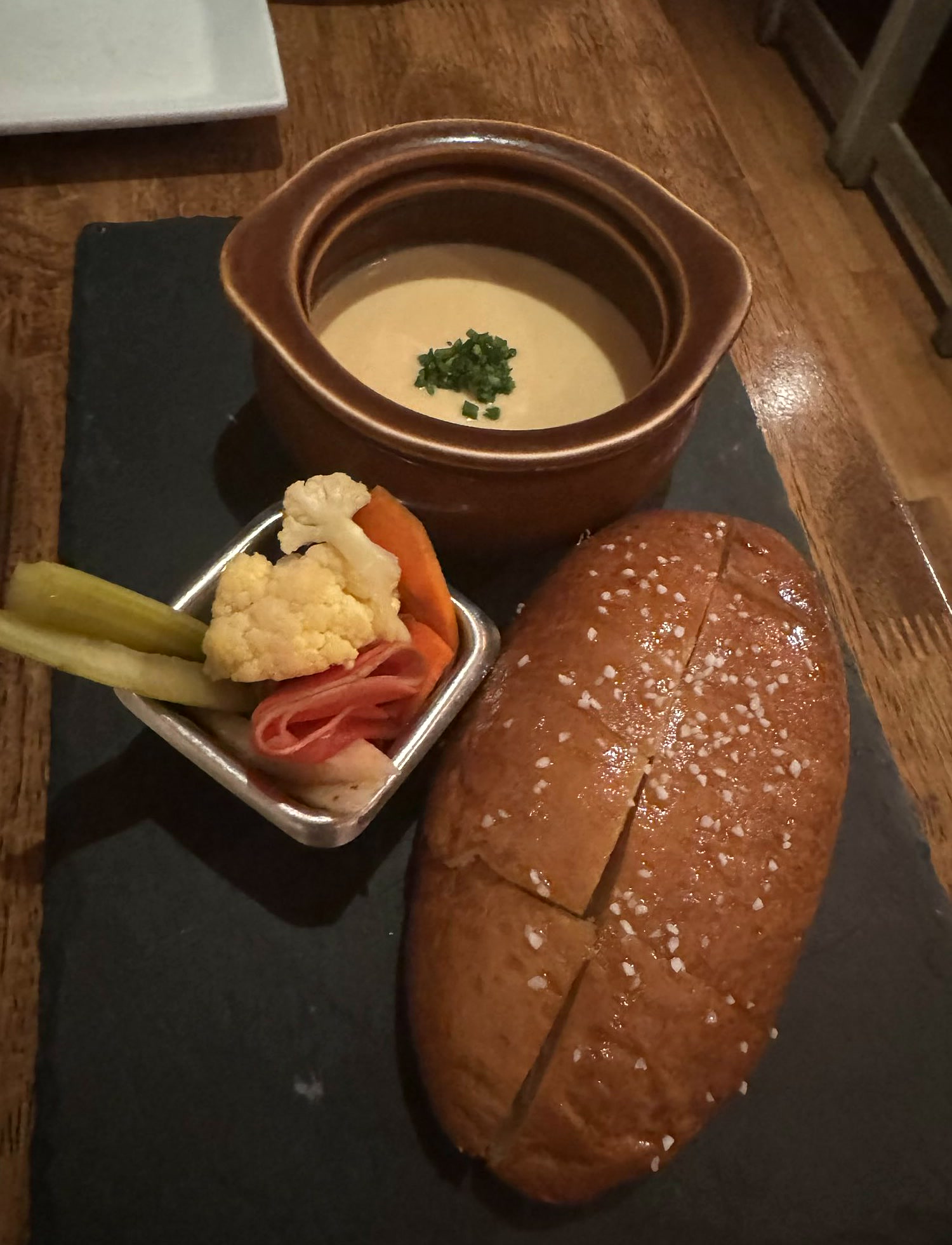 Rutabaga fondue with a soft pretzel and pickles at Vedge.