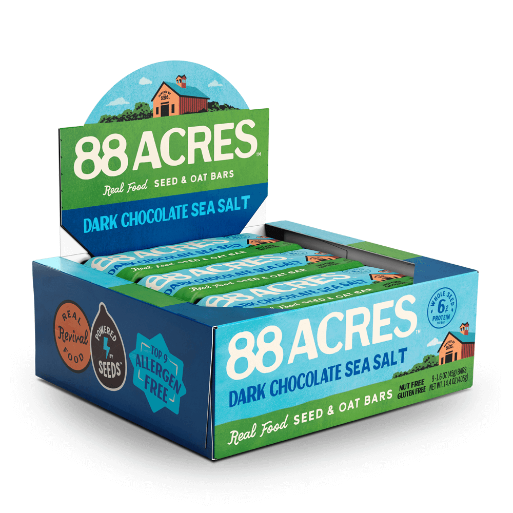 88 Acres Dark Chocolate Sea Salt Seed and Oat Bars display with wrapped bars.