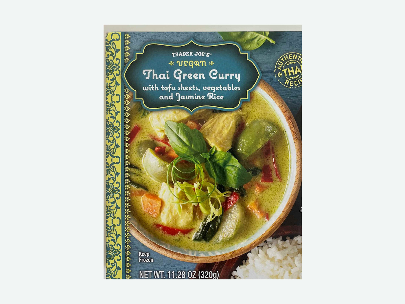 Trader Joe's Vegan Thai Green Curry package, one of the vegan frozen dinners recommended in this guide.