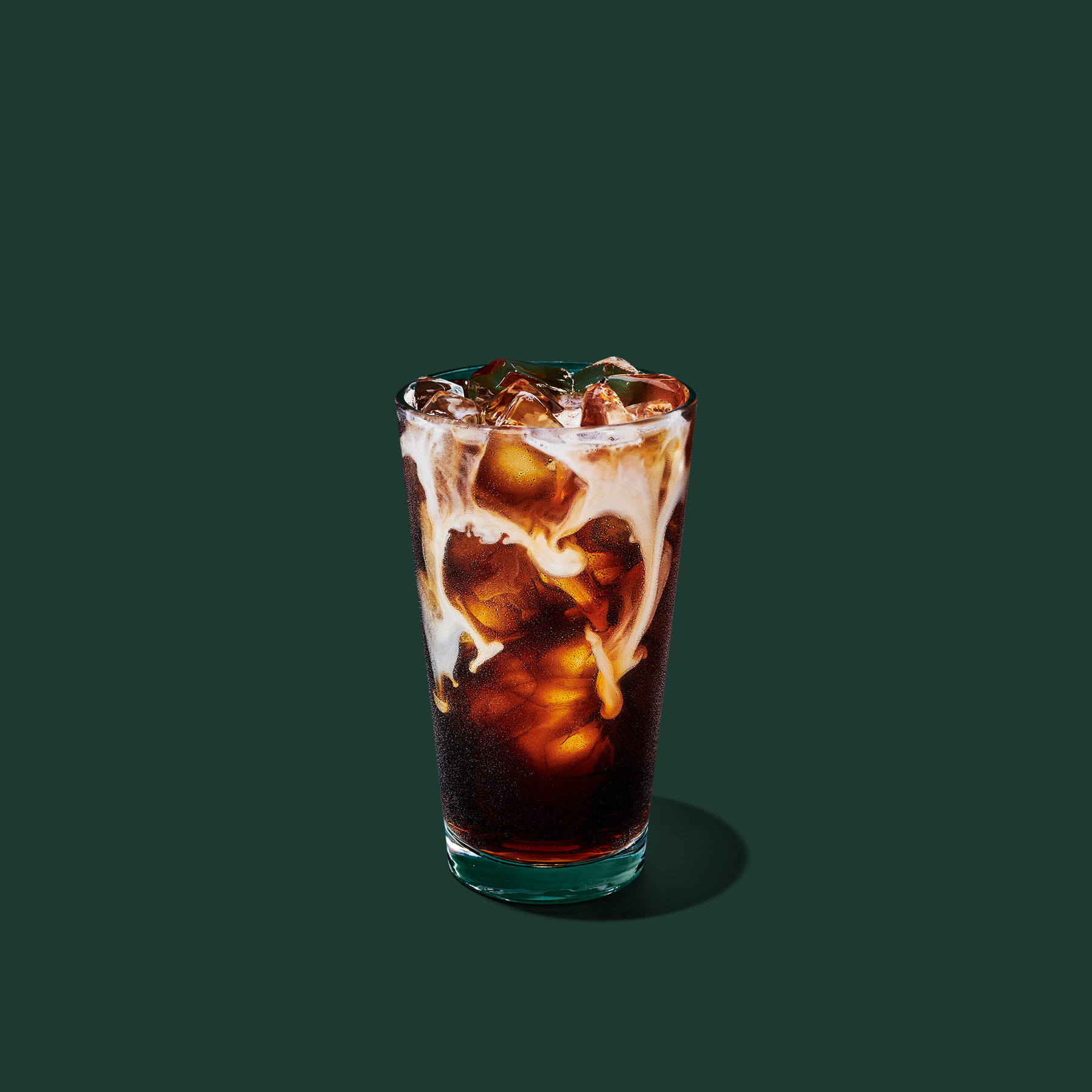 Nondairy Vanilla Sweet Cream Cold Brew with a light nondairy cream layer over dark cold brew.